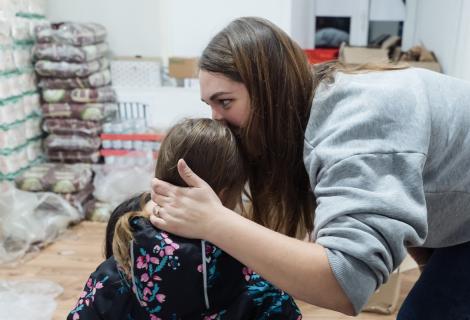 Veronika, a volunteer at Insight NGO an ActionAid partner, with her daughter Daniela at the Insight hub