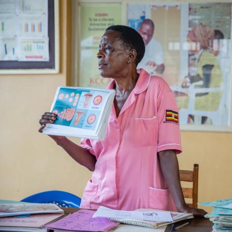 Nurse Margaret Kasolo, 57, educates women at Kawala Health Center IV in Kampala, Uganda